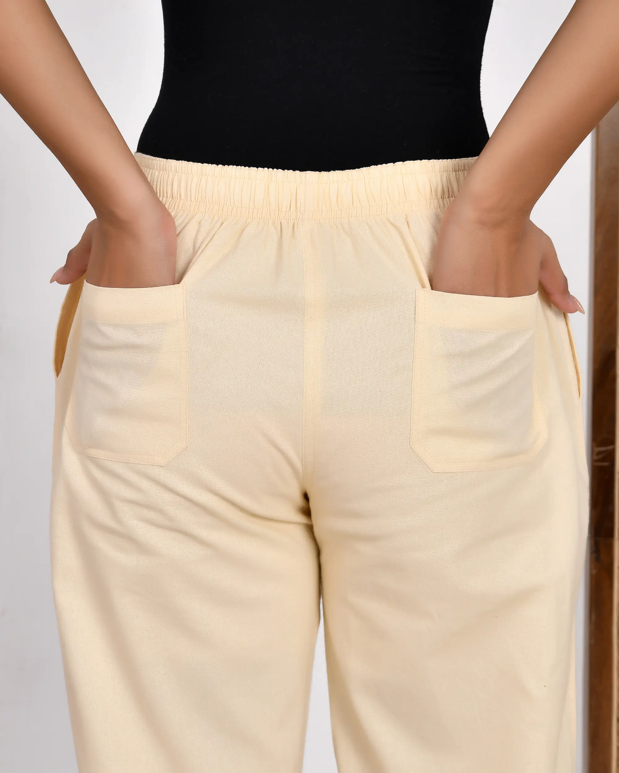 Off White Solid Straight Pants - Image 10